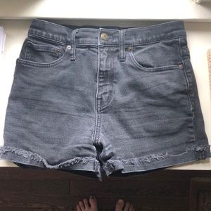 Madewell, black high-rise denim shorts.